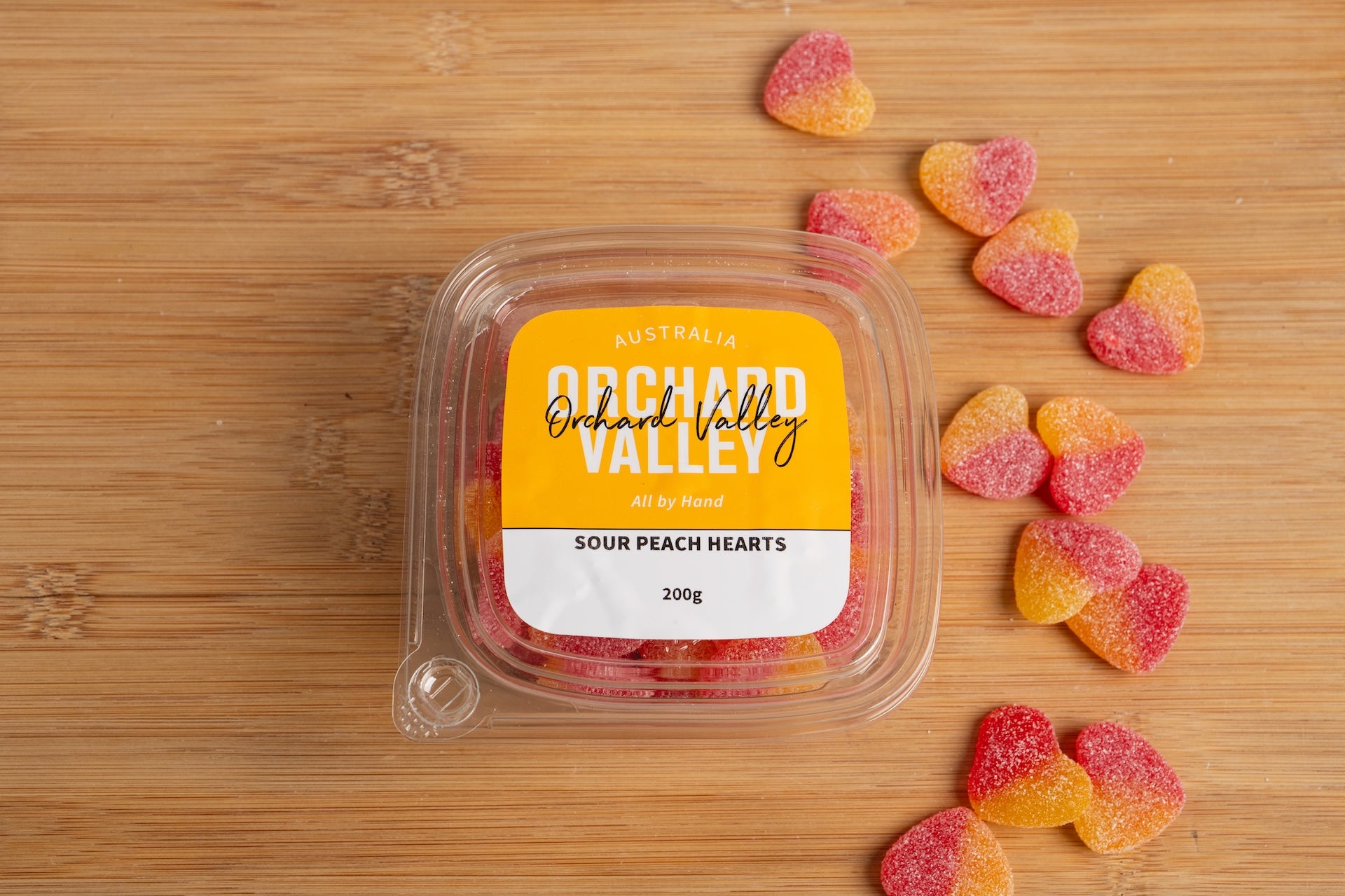 Orchard Valley Sour Peach Hearts 200g pack — a classic lolly treat to share