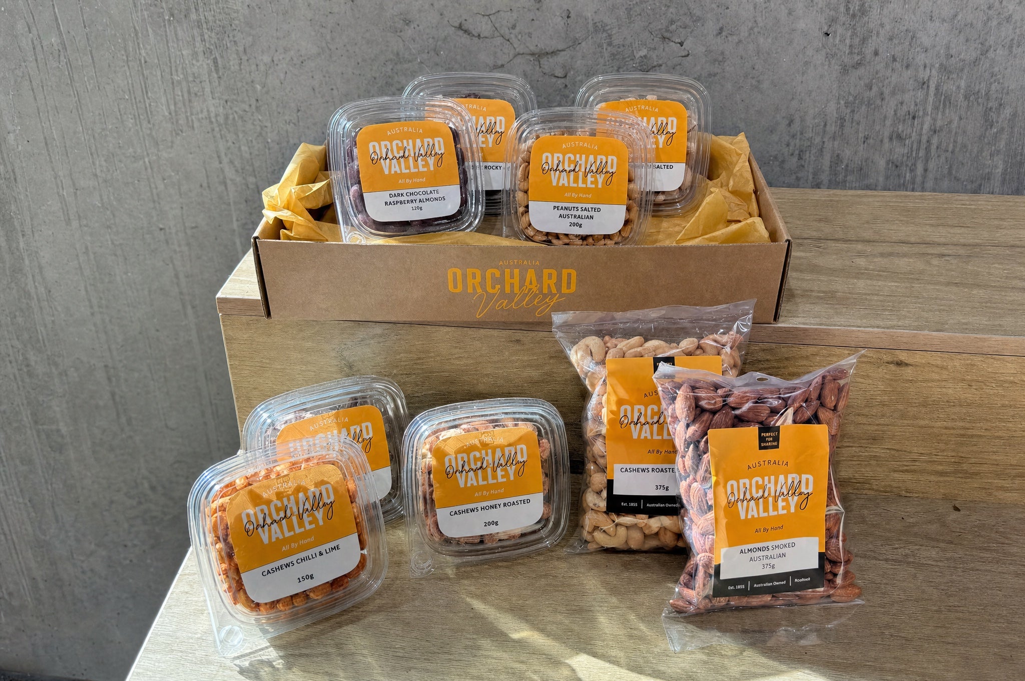 The Fathersday Nut Box — nine Orchard Valley tubs and bags in a kraft gift box
